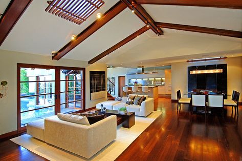 Warm mahogany floor in open plan living room, dining & kitchen areas of Hollywood Hills luxury home. Mahogany Floors, Harris House, Beams Living Room, Mahogany Flooring, Living Room Classic, Hollywood Hills Homes, Luxury Modern Homes, Wood Beam Ceiling, Open Plan Living Room