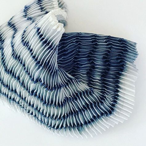 mooizeg on Instagram: “Japanese indigo silk thread sewn into tucks; pleated and steam set #shibori #pleating #experiment #swatch #trial #textiles #fiberart…” Fabric Swatches Ideas, Textile Experimentation, Interesting Silhouettes, Bomaki Shibori, Textile Experiments, 3d Shibori Fashion, Pleating Technique, Pleats Techniques, Surface Design Fabric