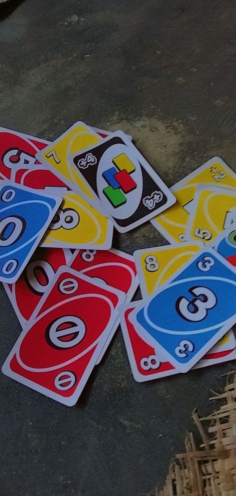 A fun game of Uno at a party with friends Uno Game Aesthetic, Playing Uno Aesthetic, Uno Cards Aesthetic, Card Games Aesthetic, Backyard Camping Sleepover, Uno Aesthetic, Gaming Outfits, Uno Game, Beach 2023