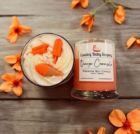 ✨ Introducing Our New Orange Creamsicle Candle! ✨ We’re thrilled to unveil our latest creation at Country Baby Soapery - the Orange Creamsicle Premium Soy Candle! 🧡 This delightful candle is sure to transport you back to those nostalgic summer days with its heavenly blend of orange and vanilla scents. 🍊🍦 Hand-poured right here in West Virginia, each candle features intricate designs with adorable orange creamsicle embeds, making it as beautiful as it is fragrant. Perfect for adding a touch ... Vanilla Scents, Nostalgic Summer, Dessert Candles, Orange Creamsicle, Hand Candle, Intricate Designs, Soy Candle, West Virginia, Home Fragrance