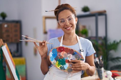 Young woman artist holding paintbrushes and palette at art studio stock photo Vector Ornaments, Woman Artist, Palette Art, Young Woman, Female Artists, Paint Brushes, Photo Studio, Art Studio, Photo Image