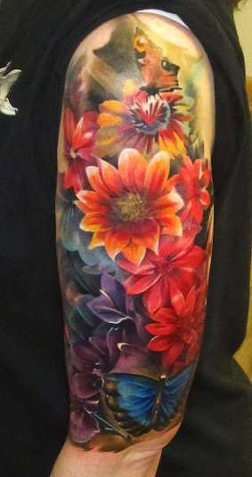 watercolor floral flower half sleeve tattoo. I just love the water colour style... I ink this might be a cool look for the red leaves with a more realistic/whimsical trunk and branches Men Flower Tattoo, Backpiece Tattoo, See Tattoo, Tattoo Themes, Watercolor Tattoo Flower, Tattoos For Women Half Sleeve, Half Sleeve Tattoos For Guys, Floral Tattoo Sleeve, Flower Sleeve