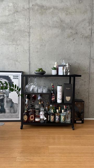 John Baptist on Instagram: "A good looking living space deserves a great bar cart! It’s been almost 1 year since I purchased this cart and honestly, I’m glad I did! • • • • • • #apartmenttherapy #homedecor #barcart #barcartstyling #apartmentdecor" Apartment Bar Cart, John Baptist, Apartment Bar, Bar Cart Styling, Apartment Therapy, Cigars, Bar Cart, Apartment Decor, Instagram A