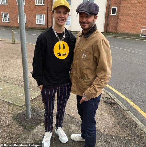 'Finally taller than you!' Romeo Beckham, 17, teases dad David, 44 | Daily Mail Online Carhartt Outfits, Carhartt Jacket Outfit, David Beckham Style Outfits, Carhartt Chore Coat, Growing Taller, Hat Fashion Men, David Beckham Style, Beckham Style, Romeo Beckham