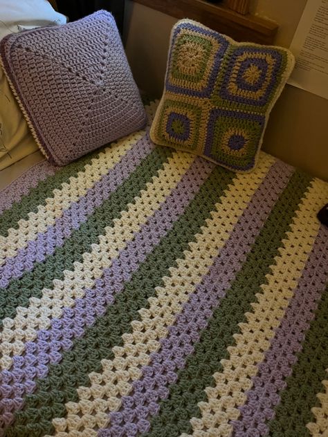 Easy Crochet Blanket Patterns, Crochet Bedspread Aesthetic, Granny Square Crochet Blanket Aesthetic, Crochet Purple Blanket, Crochet Patchwork Blanket Aesthetic, Purple And Green Granny Square, Purple And Green Crochet Blanket, Green And Purple Crochet Blanket, Purple Granny Square Blanket