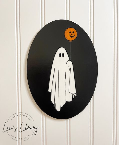 This laser engraved and hand painted wooden ghost plaque adds a touch of the Halloween spirit to any space.  Approximately 8 inches tall and 5 ¾ wide.  Whether displayed on a wall or propped up on a shelf, this ghost plaque is a versatile addition to your home decor. Lightweight enough to be hung with a command strip, no hardware will be included.   🎃 Festive Delight: While the friendly ghost makes for a delightful year-round decor piece for any spooky aesthetic, it's also a fantastic addition Wood Ghost, Wooden Ghost, Halloween Decor Ghost, Halloween Signs Diy, Halloween Plaque, Spooky Aesthetic, Ghost Art, Ghost Signs, Halloween Festivities