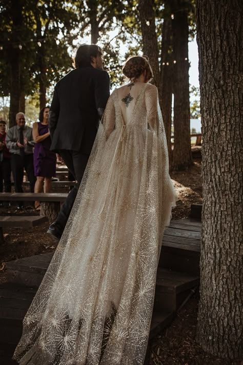 #darkromantic #moodyromantic #forestwedding #outdoorwedding #celestial #celestialwedding #celestialweddingdress #wedding #weddingideas #weddingdress #weddingphotography #weddinginspiration #weddingdecor #weddinghair #weddingflorals #weddingflowers #fairytalewedding #darkfairytalewedding Rustic Gothic Wedding Dress, Gothic Romantic Wedding Dress, Gaelic Wedding Dress, Celtic Wedding Dress Scotland, Lotr Inspired Wedding Dress, Lotr Wedding Dress, Dark Academia Wedding Dress, Fairytale Forest Wedding, Elf Wedding