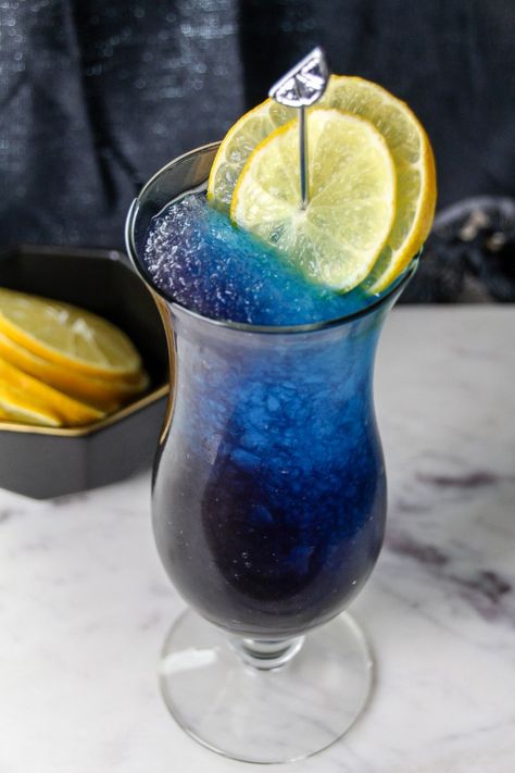 The Galaxy Mocktail is a super pretty space themed mocktail perfect for adults and kids alike. It's a refreshing slushie drink that tastes as good as it looks! Galaxy Mocktail, Summer Drinks Alcohol Recipes, Summer Drinks Nonalcoholic, Easy Alcoholic Drinks, Blue Drink, Mocktail Drinks, Summer Drinks Alcohol, Party Drinks Alcohol, Drink Recipes Nonalcoholic