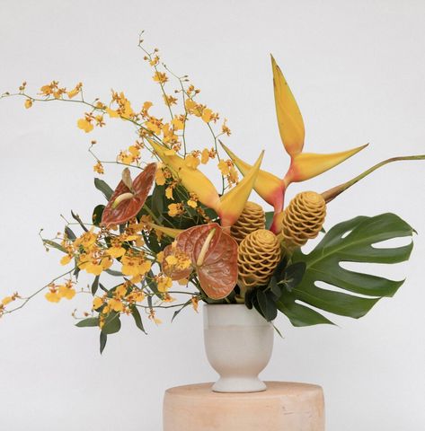 Tropical Leaves Arrangement, Tropical Boho Floral Arrangements, African Flower Arrangements, Tropical Vase Arrangement, Modern Tropical Floral Arrangements, Bird Of Paradise Floral Arrangement, African Floral Arrangements, Hawaiian Floral Arrangements, Monstera Flower Arrangement