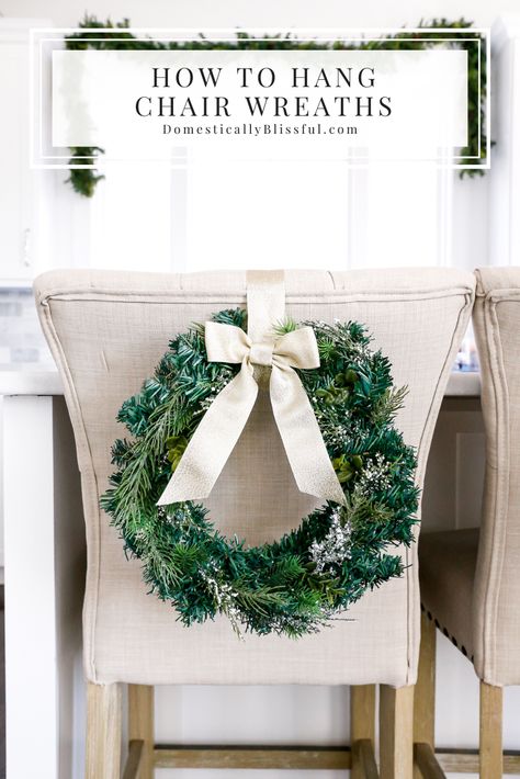 How to Hang Chair Wreaths - Domestically Blissful | How to Hang Chair Wreaths on chairs with thick fabric. | DIY | How To. | Wreath Hanging. | Chair Wreaths. | Simple Wreath Tips. | Tips and Tricks. | Wreath Tips and Tricks. | Chair Hanging Tips and Tricks. | How to Hang Chair Wreaths. | Wreath On Chair Back, Wreaths On Chairs, Chair Wreaths, Hang Chair, Domestically Blissful, Simple Wreath, Pearl Garland, Christmas Chair Covers, Wreath Hanging