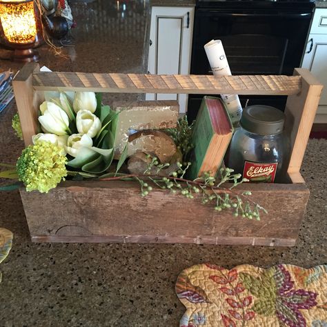 Great way to decorate an old toolbox! Makes for a great centerpiece! Tool Box Decor, Wood Box Decor, Wooden Box Centerpiece, Old Tool Boxes, Vintage Booth Display, Wood Tool Box, Antique Wooden Boxes, Wooden Tool Boxes, Box Decor