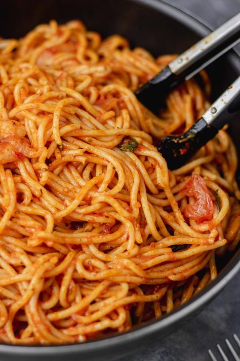 Jollof Spaghetti Recipe - My Active Kitchen Jollof Spaghetti Recipe, Jollof Spaghetti, Indomie Noodles, Chicken Macaroni Salad, African Kitchen, Chicken Macaroni, Haitian Recipes, Kenyan Food, Ghanaian Food