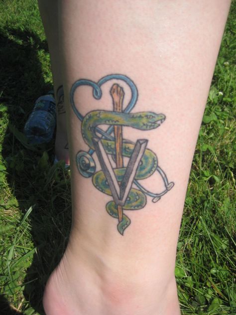 Veterinary Caduceus Veterinary Tattoo Ideas Design, Vet Symbol Tattoo, Veterinary Tattoo, Veterinarian Tattoo, Vet Tattoo, Veterinary Caduceus, Veterinarian Quotes, Veterinary Symbol, Caduceus Tattoo