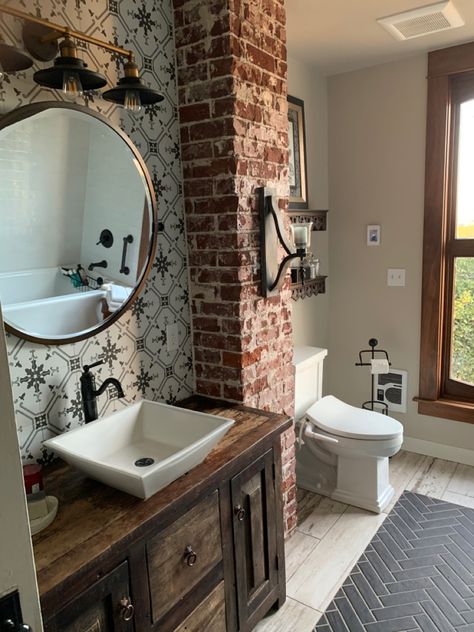 Exposed brick, custom tile, vintage vanity Red Brick Bathroom Ideas, Brick Backsplash Bathroom, Brick Floor Bathroom, Brick Bathroom Ideas, Exposed Brick Bathroom, Brick Bathroom, Red Brick Wall, Full Bathroom Remodel, Interior Tiles