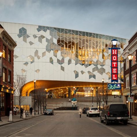 Calgary Central Library is an important hub of public life in Alberta, Canada. The architects designed an extraordinary building that pulls citizens and visitors in. The design juts out above the inner city transit line in an almost supernatural way, drawing visitors into its depths. The building was given a curtain façade with some elements prefabricated and some poured in situ.  #reckli #cocnreteformliners #concretedesign #design #architecture #architect #Calgary Central Library  #Snøhetta Library Exterior, History Jobs, Hotel Exterior, Calgary Canada, Central Library, Precast Concrete, Concrete Design, Inner City, Facade Design