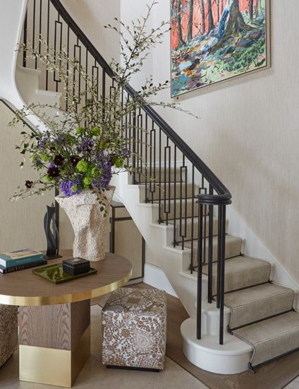 Entrance Hall Stairs, Round Foyer Table, Helen Green, Design Staircase, Foyer Furniture, Bright Artwork, Stair Railing Design, Hall Stairs, Hallway Designs