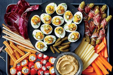 It's the season for easy football food appetizers. Whether you're tailgating, hosting, bringing, or staying home, these Game Day Appetizers will feed your crowd this football season. And bring a win every time! Cheese Breadsticks, Cheese Carrots, Easter Appetizers Easy, Peppadew Peppers, Thanksgiving Appetizers Easy, Pickled Okra, Snack Trays, Prosciutto Wrapped, Bacon Deviled Eggs