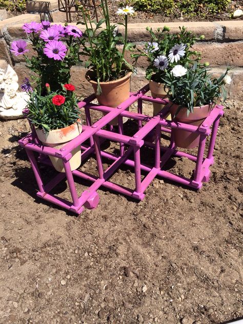 Repurposed wine rack Wine Rack Used For Plants, Metal Wine Rack Garden Planter, Accordian Wine Rack Repurpose, What To Make Out Of A Old Wine Rack, Vintage Wine Rack Repurpose, Wine Rack Table, Stackable Wine Racks, Wine Presents, Wine Bottle Display