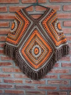 Crochet Granny Square Poncho Pattern | DIY Poncho Guide Diy Crochet Poncho, Granny Square Poncho, Crochet Baby Poncho, Poncho Design, Crochet Poncho Free Pattern, شال كروشيه, Crochet Baby Cardigan, Stitch Clothes, Crochet Poncho Patterns