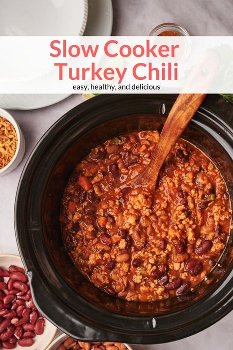 Easy to make, delicious Crockpot Turkey Chili with ground turkey, pinto beans, and kidney beans. Full of all the classic chili flavor but lightened up with ground turkey. #dinner #lunch #soup #freezerfriendly #kidfriendly #makeahead Panera Turkey Chili, Turkey Chili Crockpot, Turkey Chili Healthy, Turkey Chili Recipe, Slow Cooker Turkey Chili, Crockpot Turkey, Chili Recipe Turkey, Slow Cooker Turkey, Crockpot Chili