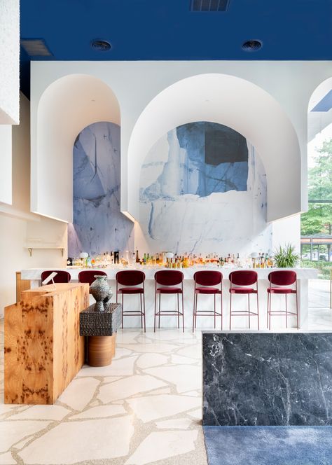 Arch Restaurant, White Marble Bar, Latin American Restaurant, Swedish Architecture, Restaurant Bar Design, Tile Artwork, Wooden Table And Chairs, Bar Design Awards, Design Café