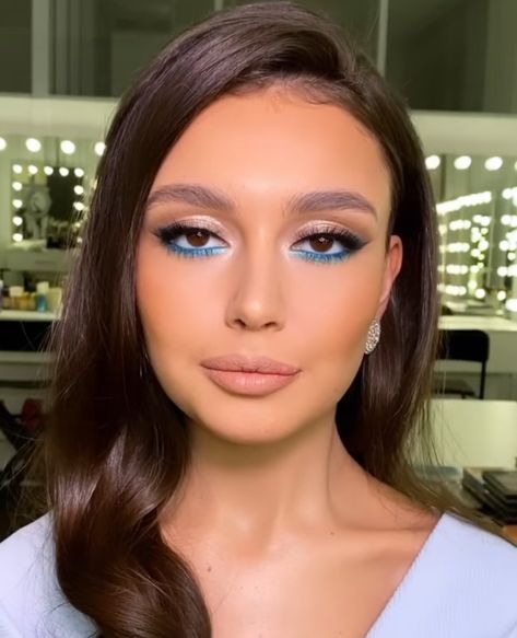 Makeup Looks With Blue Under Eye, Blue Under Eyeshadow, Makeup With Blue Under Eye, Blue Dress Makeup For Brown Eyes, Blue Eyeshadow With Brown Eyes, Blue Under Eye Makeup Look, Blue Waterline Makeup Brown Eyes, Blue And Brown Eye Makeup, Colorful Under Eye Makeup