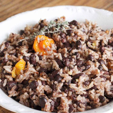 Easy Haitian Rice and Beans Recipe Haitian Chicken, Haitian Rice, Rice And Beans Recipe, Black Beans And Rice, Haitian Food Recipes, Rice And Beans, Beans And Rice, Canned Beans, Beans Recipe