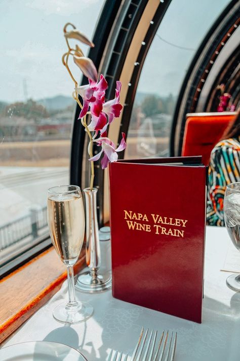 A glass of champagne on the Napa Valley Wine Train in Napa, CA. Wine Train Napa Valley, Napa Wine Train, Napa Valley Aesthetic, Wine Tour Bachelorette, Napa Valley Bachelorette, Things To Do In Napa, Nappa Valley, Napa Vineyards, Napa Valley Wine Train