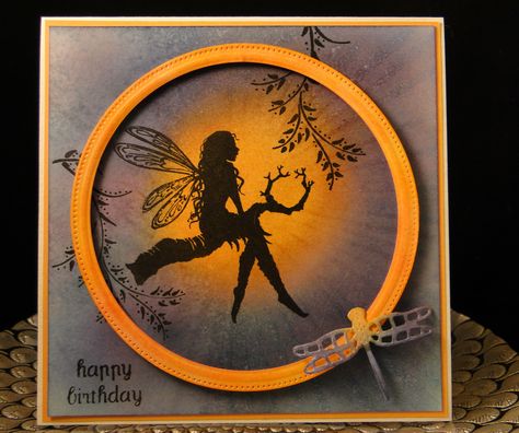 Bday Mary Ann Sept 2017 Distress Ink sponged background. Fairy Stamp from China. Circle frame die made with dies from China. Dragonfly from China. Radiant stencil used in background also from China but no longer available. Designed and Created by Peggy Dollar Lavina Stamps, Lavinia Cards, Fairy Cards, Lavinia Stamps Cards, Fairy Silhouette, Silhouette Cards, Circle Frame, Lavinia Stamps, Beautiful Handmade Cards