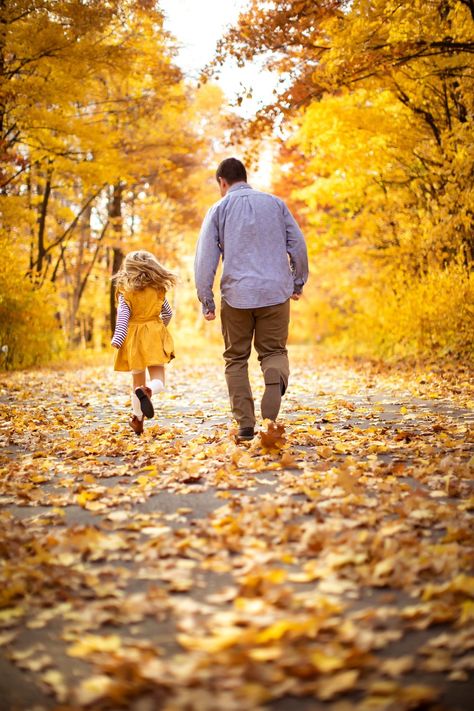 Young girl in bright yellow dress running down a path covered in fall leaves with her dad. Fall Photos Ideas Family, Fall Family Photos Leaves, Fall Family Photoshoot Ideas With Teenagers, Kids Fall Photoshoot Ideas, Family Pictures Park, Unique Fall Photoshoot Ideas Family, Fall Leaves Family Photos, Outdoor Fall Pictures Family, Autumn Photography Family