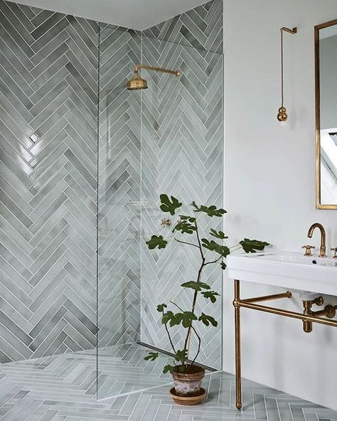 Oh. My. Gosh.! This green herringbone tile is incredible... but the fact that it was installed not only on the shower walls but floor really creates a stunning texture and pattern! #Inspiration  #GreenBasementsAndRemodeling #MasterBathroom #Shower #Tile #Bathroom #RoswellRemodel #AtlantaConstruction #AlpharettaRemodel Prints Bathroom, Bilik Air, Basement House, Decor Paintings, Herringbone Tile, Bathroom Inspiration Decor, Paintings Prints, Shower Remodel, Bathroom Inspo