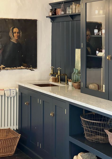 Utility inspiration here. We like tucking the sink in the corner in these sorts of spaces, it looks utilitarian and leaves you with plenty of space on the worktop for potting up plants, folding laundry, flower arranging, and all those other daily tasks. #deVOLKitchens #UtilityRoom Kitchen Marble Worktop, Pantry Blue, Utility Room Inspiration, Marble Worktop, Old Farmhouse Kitchen, Devol Kitchens, Shaker Style Cabinets, Galley Kitchens, English Decor