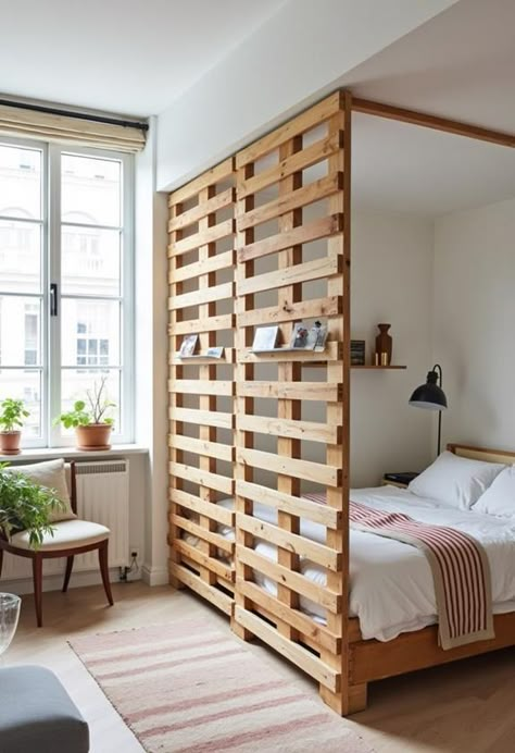 Room dividers offer an affordable and versatile solution for creating distinct spaces in small apartments or studios. They come in various forms, from bookcases and curtains to plants and folding screens. These budget-friendly options not only separate areas but can also add style and storage to your space. There's a clever trick that can transform your entire room. Room Divider Closet Ideas, Wardrobe Room Divider Small Spaces, Closet Room Dividers, Small Room Divider Ideas Bedrooms, Small Bedroom Partition, Dividing A Small Room, Divided Studio Apartment, Dividing Studio Apartment, Tiny Apartment Room Ideas