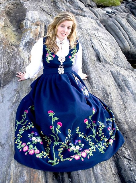 This stunning outfit originated in Leksvik area of Norway. The flowers that are embroidered on the outfit are typical of the flowers found in the fields around Leksvik.   This version of traditional Norwegian clothing was developed in 1992 by Olga and Inger Gangstad. Norwegian Costume, Norwegian Dress, Nordic Clothing, Norway Fashion, Norwegian Clothing, Norwegian Fashion, Scandinavian Costume, Folk Clothing, National Dress