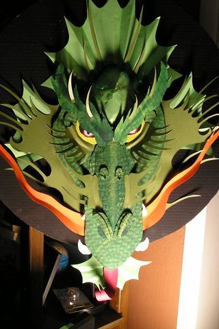 I used cardboard to make this art piece. Look at the pictures and view the image notes to see how it was constructed. Cardboard Dragon, Medieval Party, Dragon Mask, Origami Dragon, Folding Origami, Theme Harry Potter, Dragon Crafts, Dragon Birthday, Dragon Costume