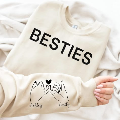 Personalized Besties Hoodie with Name on Sleeve For Best Friends, Matching Besties Trip Sweatshirt, Cute Birthday Gift For Friend, Preppy,  989 -If you would like any other color of t-shirt, sweatshirt, hoodie, etc., please let me know by sending a message. I will provide it for you. ----------- How to Order Your Custom Design T-shirt ---------- * Choose your t-shirt color * Choose your size * PLEASE make sure all your order's steps Unisex Soft-Style T-shirt The unisex soft-style t-shirt puts a Other Names For Best Friend, Diy Matching Hoodies For Best Friends, Cute Sweatshirts For Best Friends, Bestie Hoodie Ideas, Hoodies For Besties, Bestie Sweatshirts Hoodies, Make Sweatshirts With Your Bestie, Best Friends Matching, Best Friend Hoodies