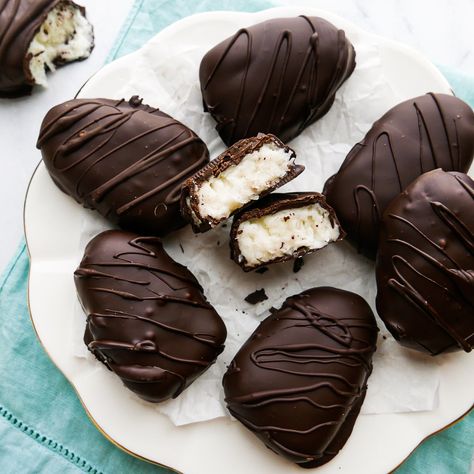 These coconut Easter eggs are reminiscent of the classic candy, and they're so easy to make from scratch. The smooth and creamy filling is made with vanilla flavored coconut cream and flakes of sweetened coconut for taste and texture. For the decadent finish, they're dipped in rich dark chocolate to create the perfect spring dessert. Coconut Easter Eggs, Spring Dessert, Make From Scratch, Classic Candy, Spring Desserts, Chocolate Cheese, Creamed Eggs, Bittersweet Chocolate, Chocolate Coconut