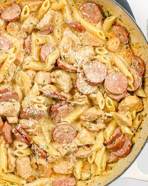 This is the best Cajun Chicken Pasta recipe! It's creamy, cheesy, loaded with flavor, and on the table in 30 minutes! An easy weeknight dinner your whole family will love. #cajunchickenpasta #cajunchicken #recipe Zydeco Pasta Recipe, Conecuh Sausage Pasta, Recipes With Cavatappi Pasta, Cajun Tortellini Pasta, Dinner Recipes Kielbasa, Dinner For A Crowd Families, Jo Cooks Recipes, Cajun Chicken Pasta With Sausage, Cajun Pasta With Sausage