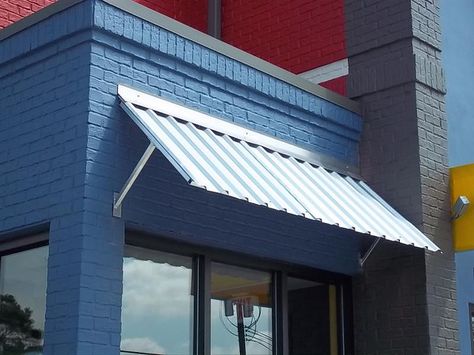 Corrugated metal awning Corrugated Metal Roofing, Metal Awnings, Industrial Exterior, House Awnings, Metal Awning, Window Awning, Corrugated Tin, Corrugated Metal Roof, Door Awnings