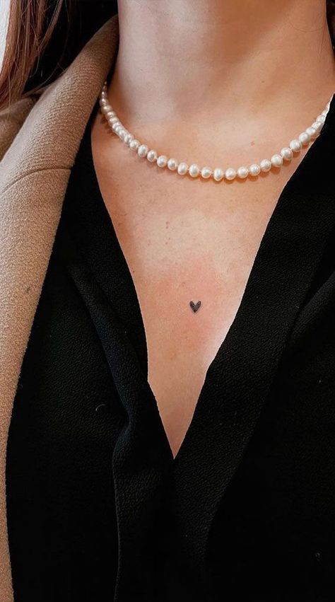 Neck Heart Tattoos Women, Women Small Chest Tattoo, Tiny Heart Tattoos For Women, Dainty Chest Tattoos For Women, Delicate Chest Tattoo, Unique Tiny Tattoos For Women, Heart On Chest Tattoo, Small Collarbone Tattoos For Women, Heart Sternum Tattoo