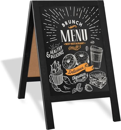 Store New Arrivals Add to Favorite View Feedback Contact Wooden A-Frame Sign with Eraser & Chalk - 21 X 30 Inches Magnetic Sidewalk Chalkboard – Sturdy Freestanding Black Sandwich Board Menu Display for Restaurant, Business or Wedding Description LARGE MAGNETIC SURFACE provides ample writing space to advertise deals, promote specials, make jokes and more. Perfect for businesses, restaurants and weddings! INCLUDES ERASER & CHALK – This elegantly crafted wooden a-frame sign comes with a magnetic eraser and four pieces of white chalk for your convenience. BUILT TO LAST – With a heavy weight wooden frame, sturdy chalkboard surface, and durable design this sandwich board sign will withstand winds and last for years. PERFECT FOR INDOOR & OUTDOOR USE – Designed for both indoor and outdoor use, th Sidewalk Chalkboard Sign, Papan Tulis Kapur, Cafe Chalkboard, Sandwich Board Signs, A Frame Sign, Menu Display, Backyard Graduation Party, Outdoor Graduation Parties, Sidewalk Sign