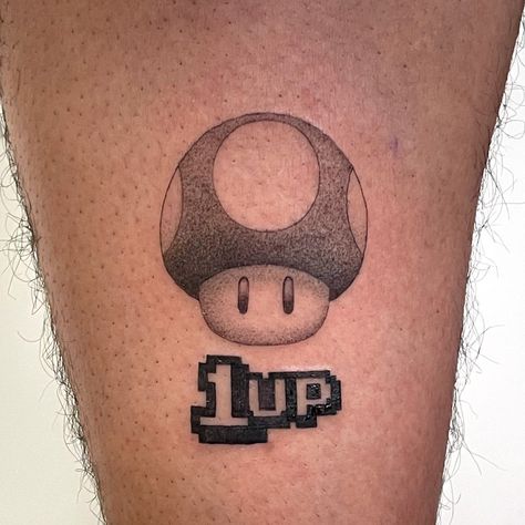 Super Mario Mushroom Tattoo, 1up Tattoo, Toad Tattoo Mario, Super Mario Tattoo Design, Mario Mushroom Tattoo, Super Mario Tattoo, Super Mario Mushroom, Phoenix Tattoo For Men, Mario Tattoo