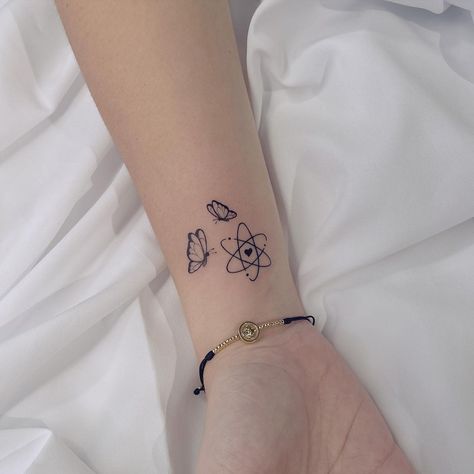 cool 26 Atomic Tattoos for Science Lovers in 2021 Tiny Science Tattoo, Matching Science Tattoos, Science Themed Tattoos, Cute Science Tattoos, Photosynthesis Tattoo, Biology Inspired Tattoos, Women In Stem Tattoo, Nerdy Tattoos Women, Scientist Tattoo Ideas