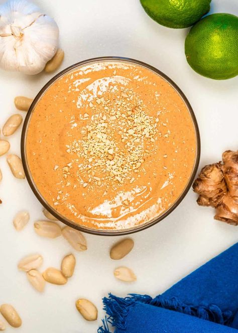 Creamy Thai Peanut Sauce made with Coconut Milk - Dances with Knives Thai Peanut Sauce With Coconut Milk, Peanut Sauce With Coconut Milk, Rose Sauce Recipe, Cocnut Milk, Thai Peanut Sauce Recipe, Vegan Peanut Sauce, Thai Salad Dressings, Spring Roll Sauce, Peanut Sauce Noodles