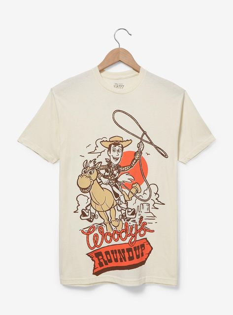 Get dressed up in wild west fashion with this Toy Story-inspired tee! Featuring a tonal portrait of Woody and Bullseye above "Woody's Roundup" lettering  this shirt is perfect for your next rodeo or trip to the Disney Parks.A BoxLunch Exclusive!100% cottonListed in unisex sizesWash cold with like colors; dry lowDo not iron over printImported Woody Birthday Shirt, Disney February, Woody And Bullseye, Wild West Fashion, Disneyland Fashion, Woody Birthday, Toy Story Gifts, Toy Story Shirt, Woody Toy Story