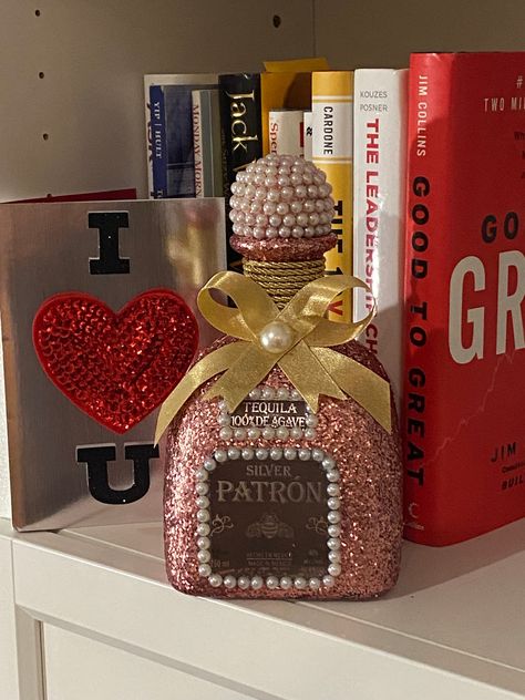 Glamour up your tequila game with this glitzy Patron bottle! Perfect as a unique gift for any gala event, this 750ml rose gold beauty comes empty but sealed - no hangovers here! Add a jolt of conversation to your bar, family room, or man cave. Looking for other colors? Check out my other listings, or drop me a line if you don't spot one you like! Bar Family Room, Alcohol Bottle Decorations, Bedazzled Liquor Bottles, Bedazzled Bottle, Alcohol Bottle Crafts, Decorated Liquor Bottles, Patron Bottle, Bling Bottles, Liquor Bottle Crafts