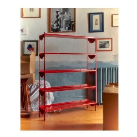 Red Shelves Home Decor, Red Metal Shelf, Cycling Cafe, Ornament Shelf, Red Bookcase, Red Bookshelf, February Inspiration, Red Shelves, Aluminum Shelves