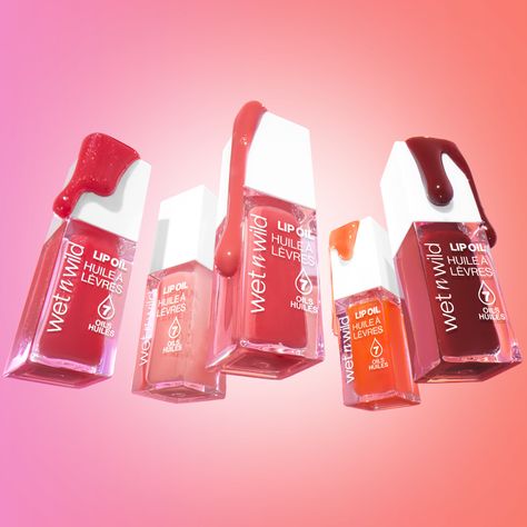 Dropping in from lippie paradise, our Lip Oils are here to make it a hot lips summer 👄🥵 Choose from 11 hydrating shades for intense shine & a pop of color⁠
⁠
Get our Lip Oils NOW @Walmart and Walmart.com #wetnwildbeauty #wnwlipoil #crueltyfree Lip Oil Photography, Lipstick Product Photography, Oil Photography, Rhode Skin, Lip Oils, Product Styling, Liquid Highlighter, Hot Lips, Hailey Bieber