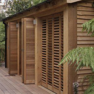 Modern Shutters in London - Contemporary Shutters | TNESC Contemporary Shutters, Wood Window Shutters, Modern Shutters, Villa Terrace, Wooden Window Shutters, Outdoor Shutters, Modern Gazebo, Florida House Plans, Sliding Shutters