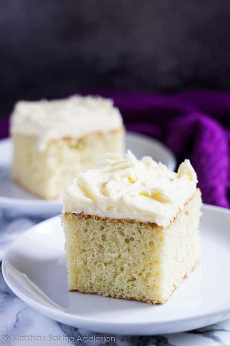 Perfect Vanilla Sheet Cake - Deliciously moist and fluffy vanilla cake baked in a rectangle pan, and topped with scrumptiously creamy vanilla buttercream frosting! Fluffy Vanilla Cake Recipe, Vanilla Sheet Cake, Whipped Buttercream Frosting, Vanilla Sheet Cakes, Peanut Butter Sheet Cake, Whipped Buttercream, Lemon And Coconut Cake, Creaming Method, Pumpkin Sheet Cake